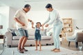 Happy grandparents, girl and dance holding hands in home living room with music having fun sharing love, energy and bond