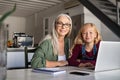 Happy granny and smiling little girl study at home Royalty Free Stock Photo