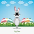 Happy gray bunny green field colorful eggs