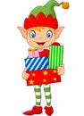 Happy green elf boy costume holding birthday gifts Royalty Free Stock Photo