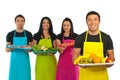 Happy greengrocer and market workers