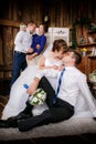 Happy groom, bride, groomsman, bridesmaid are in the room Royalty Free Stock Photo