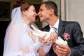 Happy groom and bride holding wedding pigeons Royalty Free Stock Photo