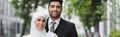 happy groom hugging muslim bride in Royalty Free Stock Photo