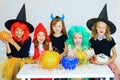 Happy group of children in costumes during Halloween party