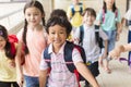 Happy Group of elementary school kids running forward Royalty Free Stock Photo