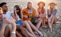 Happy group of friend having party on the beach Royalty Free Stock Photo