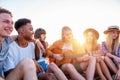 Happy group of friend having party on the beach Royalty Free Stock Photo