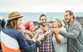 Happy group of friends celebrating with sparkling stars fireworks outdoor - People having fun enjoying a moment together Royalty Free Stock Photo
