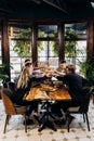 Happy group of friends drinking and clinking with beer and cocktails at brewery bar restaurant Royalty Free Stock Photo