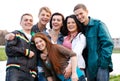 Happy group of friends smiling outdoors