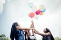 Happy group girl friends hand holding multicolored Royalty Free Stock Photo