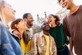 Happy group of Multiracial young friends having fun together in city street Royalty Free Stock Photo