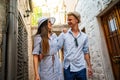 Happy group of young couple enjoying sightseeing tour in the city on summer vacation. Royalty Free Stock Photo