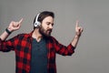 Happy Guy Listening to Music with Headphones Royalty Free Stock Photo
