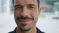 Happy guy posing street portrait. Young brunette latin man face looking camera Royalty Free Stock Photo