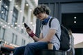 Happy guy wondering with coffee and smartphone stock photo Royalty Free Stock Photo