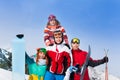 Happy guys standing with snowboards and skis Royalty Free Stock Photo