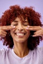 Happy, hair and woman hands on face in studio for natural, cosmetic or wellness on purple background. Haircare, beauty