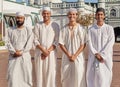 Happy, hajj and Muslim men at a mosque to pray, ramadan faith and group in Mekka together. Smile, religion and portrait