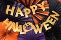 Happy Halloween background decorated with round paper fans. Royalty Free Stock Photo