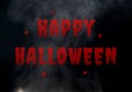 Happy Halloween on black background and smoke. Halloween day night party backdrop. Halloween day wallpaper. Red Happy Halloween Royalty Free Stock Photo