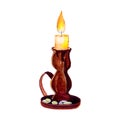 Happy Halloween. Burning candle in a ceramic candle holder. The candle burns, melts