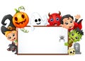 Happy Halloween character holding blank sign Royalty Free Stock Photo