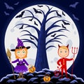 Happy Halloween. Children in halloween costumes. Devil and witch