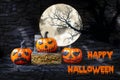 Happy Halloween concept background, Funny face pumpkin with gold treasure box Royalty Free Stock Photo