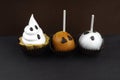 Happy Halloween cupcakes decorated with cream and chocolate Royalty Free Stock Photo