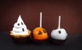 Happy Halloween cupcakes decorated with cream and chocolate Royalty Free Stock Photo