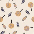 Happy Halloween cute vector seamless pattern with sweets and lollipops. Creative childish texture in scandinavian style Royalty Free Stock Photo