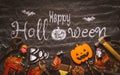 Happy Halloween day with construction DIY handy tools on black chalk board background concept. Flat lay Top view