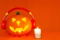 Happy Halloween decorations festival and music concept background.Mix variety and pumpkin listening music Royalty Free Stock Photo