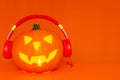 Happy Halloween decorations festival and music concept background.Mix variety and pumpkin listening music Royalty Free Stock Photo