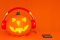 Happy Halloween decorations festival and music concept background.Mix variety and pumpkin listening music Royalty Free Stock Photo