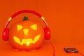 Happy Halloween decorations festival and music concept background.Mix variety and pumpkin listening music Royalty Free Stock Photo