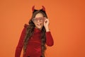 happy halloween devil kid in imp horns and party glasses having fun, halloween look Royalty Free Stock Photo