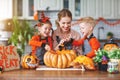 Happy Halloween! family mother and children getting ready for ho Royalty Free Stock Photo