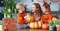 Happy Halloween! family mother and children getting ready for ho Royalty Free Stock Photo