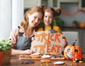 Happy Halloween! family mother and daughter getting ready for Royalty Free Stock Photo