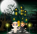 Happy halloween in front of the haunted house with full moon background Royalty Free Stock Photo