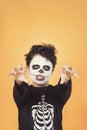 Happy Halloween. funny child in a skeleton costume of halloween