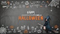 Happy halloween with girl kid in witch costume riding broomstick on spooky dark black chalkboard with chalk doodle