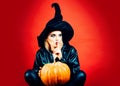 Happy Halloween gothic young woman in witch halloween costume. Secret Halloween. Royalty Free Stock Photo