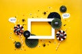 Happy halloween holiday concept. DIY paper decorations on bright yellow background with black spider, eyes, confetti Royalty Free Stock Photo