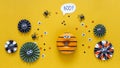 Happy halloween holiday concept. Funny food for kids - scared donuts bright yellow background with black spider and eyes Royalty Free Stock Photo