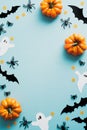 Happy halloween holiday concept. Halloween decorations, bats, ghosts, spiders, pumpkins on blue background. Halloween party poster Royalty Free Stock Photo
