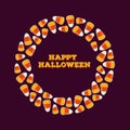 Happy halloween inscription with circle frame made of small candy corns. Holiday trick or treat greeting card, poster. Royalty Free Stock Photo